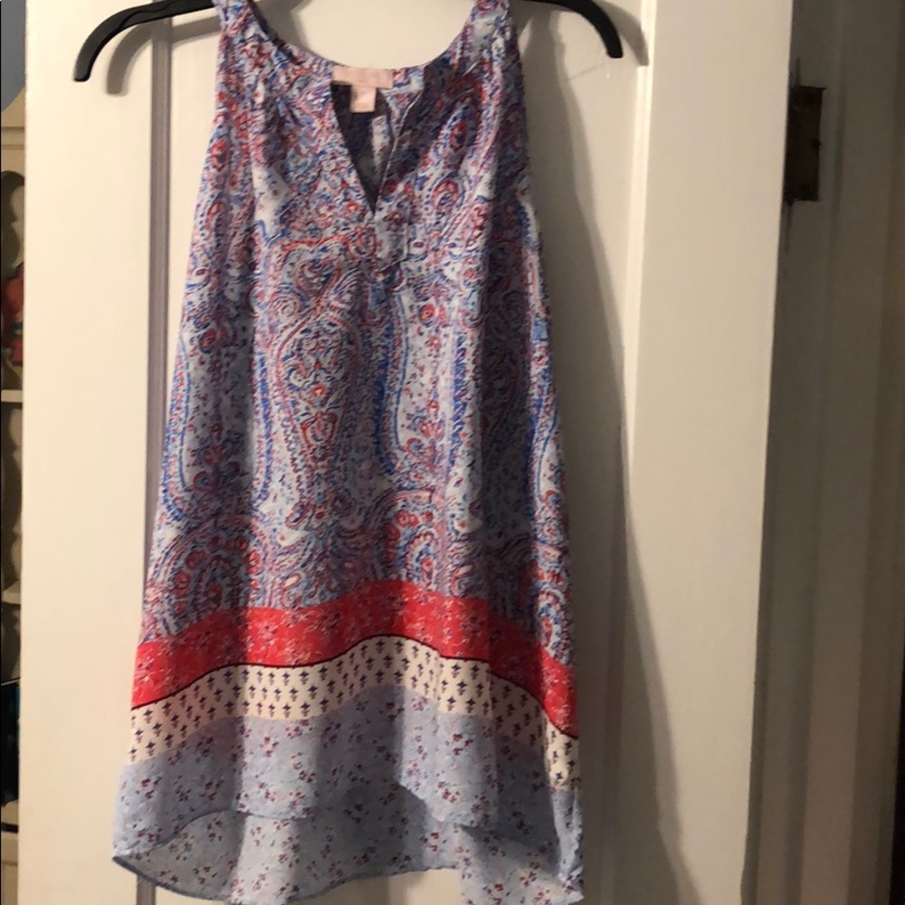 Vibrant colored top that looks good with a skirt